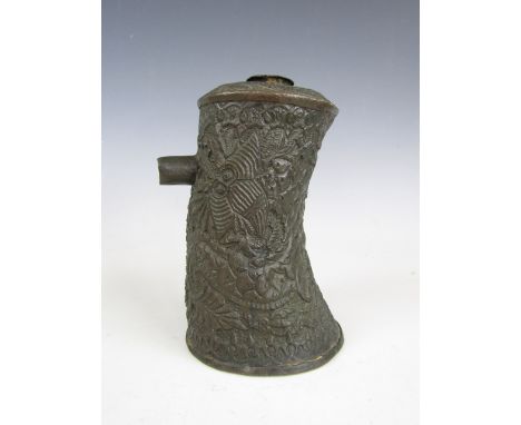 An antique Chinese or Asian copper flask, chased overall in a pattern of sea monsters or dragons, 15.5 cm