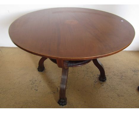A late 19th / early 20th Century inlaid mahogany centre table, the circular top having string-inlaid edge and centred by a ma