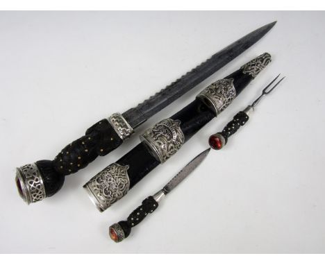 A late Victorian Argyll and Sutherland Highlanders Volunteer Battalion officer's dirk, the etched blade and elaborate scabbar