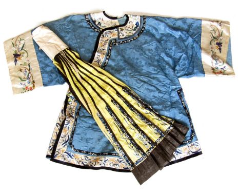 A Chinese Qing Dynasty lady's domestic coat and skirt, in blue and yellow silk damask with silk floss embroidery depicting cr