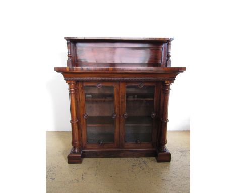 A fine William IV / early Victorian rosewood chiffonier, having a low back supporting a shelf raised on turned columnar suppo