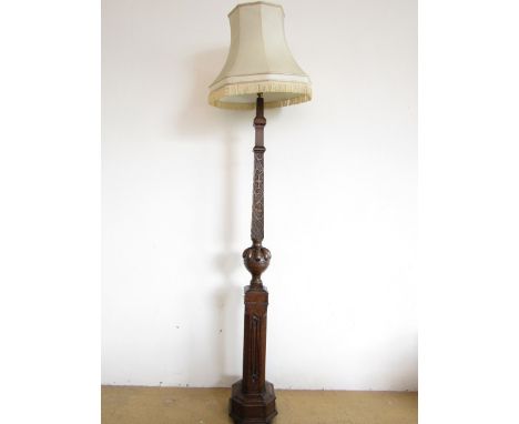 A 1920s / 30s 'Jacobeathan' carved oak standard lamp, 170 cm