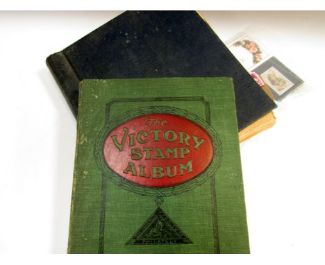A Victory Album, and another containing GB and World used stamps, loose used and mint stamps, three commemorative sets, two V