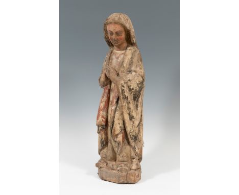 Virgin of the Annunciation; Spain, 13th-14th century.Carved and polychromed wood.Faults in the carving and polychromy. Damage