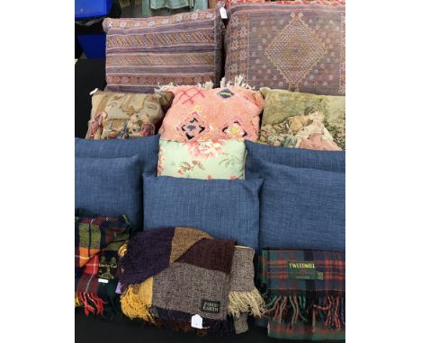 A selection of cushions to include two Moroccan floor cushions, tapestry cushions etc together with three throws contained wi