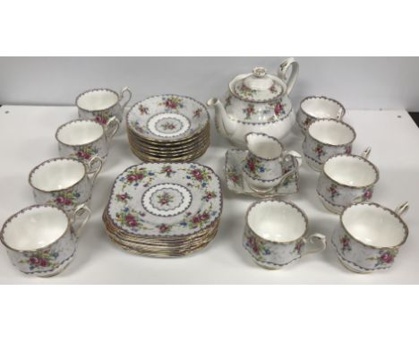 A Royal Albert "Petit Point" pattern tea set comprising teapot, milk jug, rectangular dish, eight cups, nine saucers and nine