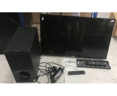 A Sony KDL-32WD751 32" flatscreen television, date of manufacture 2017/12 plus speaker