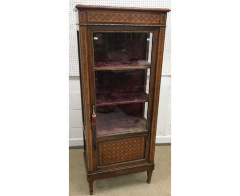 A late 19th Century French rosewood and parquetry inlaid vitrine, the rosso marble top within a moulded edge over a lattice i