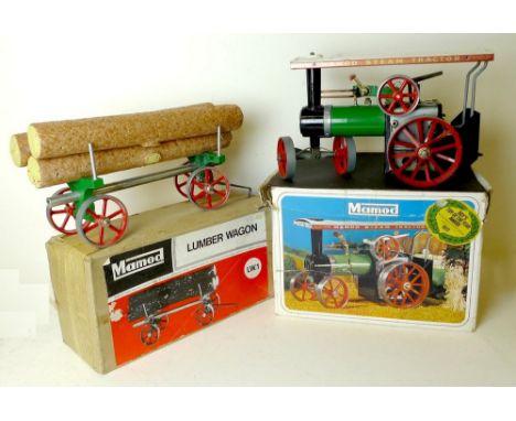 A Mamod Steam Tractor with a lumber wagon, LWI, both boxed. 