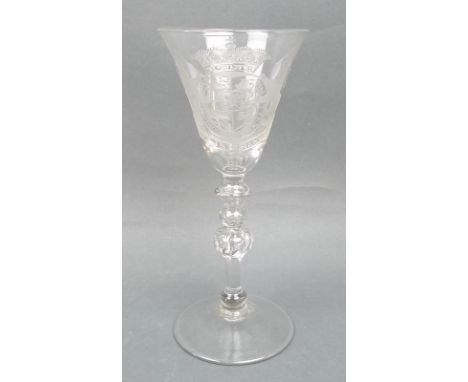 A Newcastle light baluster wine glass, circa 1760, the ound funnel bowl engraved with the Arms of William IV of Orange Nassau