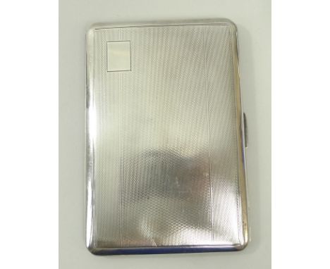 A silver cigarette case with engine turned decoration, Birmingham 1943, 6.9toz. 