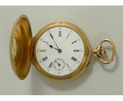 A lady's 18ct gold hunting cased pocket watch, the white enamel dial bearing Roman numerals, subsidiary seconds dial, inner b