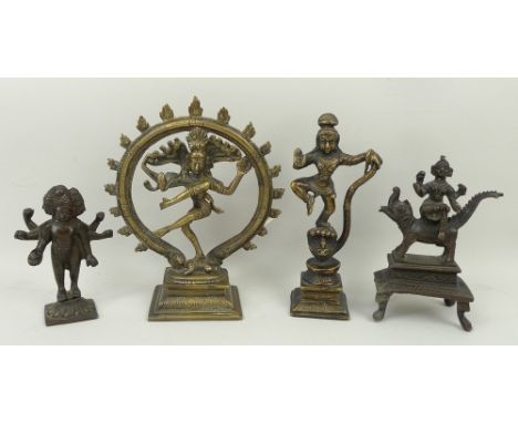 A group of four Indonesian Hindu deities, comprising two brass, 18cm high, and two bronze, 12 and 15cm. 