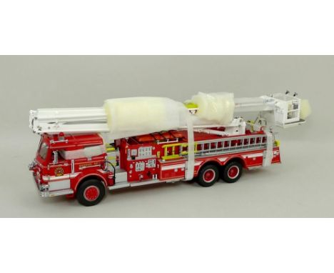 A Franklin Mint model, scale 1:32 of a Pierce Snorkel Fire Truck, mint and boxed.