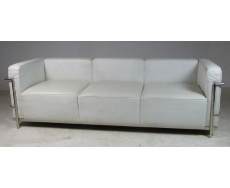 A Le Corbusier style Grand Comfort chrome show frame and cream leather three seater sofa, 210 by 72 by 65cm high.