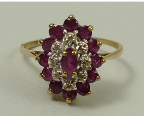 A 9ct gold ruby and diamond cluster ring, size Q, 2.6g.