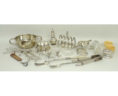 A silver quaiche, Sheffield 1932, pair of grape scissors, pepperette, Birmingham 1913, a four division toast rack, Sheffield 