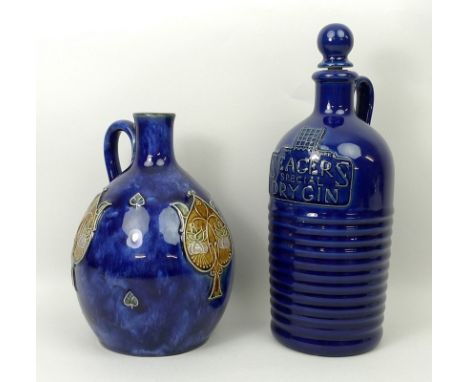 A Royal Doulton stoneware jug decorated with Art Nouveau floral motifs against a blue ground, no 7237, impressed marks, 18cm 