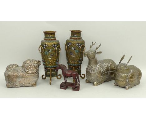 A group of South East Asian white metal hollow figures, cast as a Buddhistic lion dog, rabbit, and deer, with engraved and re
