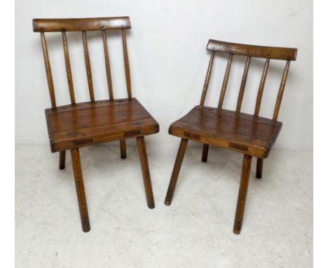 Two elm milking chairs with stick backs and square seats, larger 47 by 49 by 80cm high. (2)