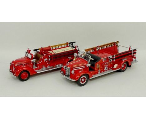 A Franklin Mint model, scale 1:32 of a 1948 Mack fire truck, and another of a 1938 Ford Fire Engine, both mint and boxed. 