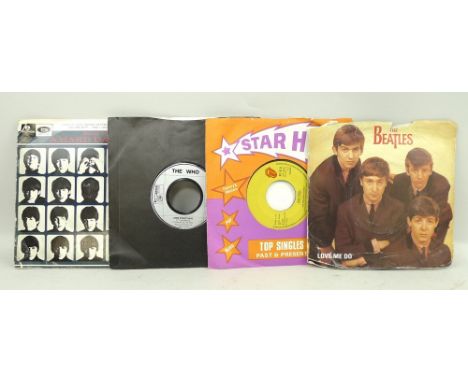 A collection vintage vinyl records, including The Beatles, Queen, Bob Marley, Elvis and The Who. (250)