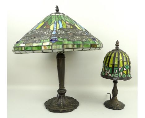 A Tiffany style table lamp, the shade decorated with dragon flies with blue glass eyes, 50cm, and another similar Tiffany sty