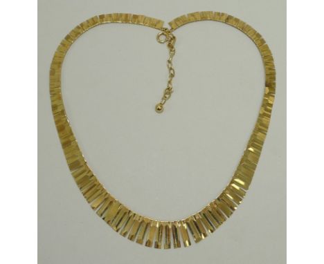 A lady's 9ct gold fan shaped necklace on a belcher link chain and bolt ring clasp, 18.7g.