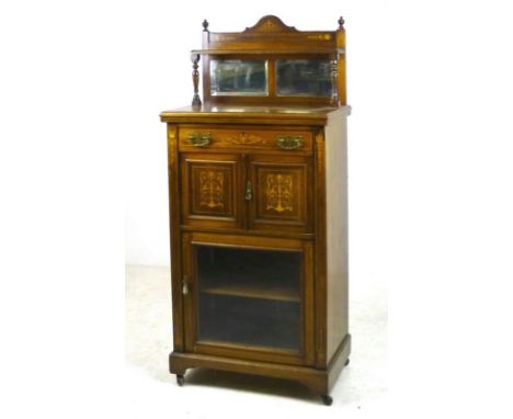 A Victorian rosewood and satinwood inlaid mirror back music cabinet with a single frieze drawer above one panelled and one gl