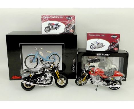 A Biante 1:12 scale model of a Norton 961SE Commando in black and gold, a Commando 961 Sport in red and gold, Schuco NSU Quic