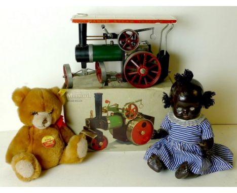 A Mamod steam roller engine, complete with box, together with a Steiff Petsy bear and a vintage doll. (3)