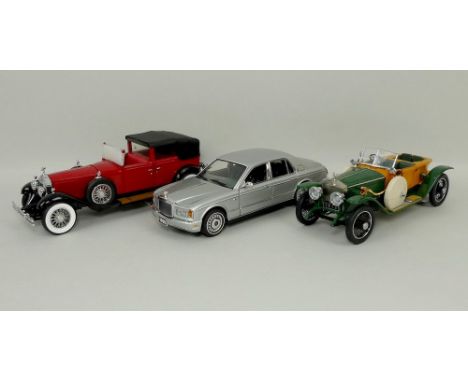 A Franklin Mint model, scale 1:24, of a Rolls Royce Phantom 1, another of a 1924 wooden bodied Rolls Royce, and a third of a 