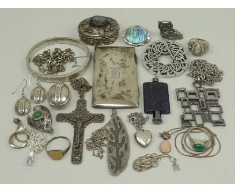 A quantity of silver and costume jewellery including a Georg Jensen heart shaped locket, a vintage silver and paste ring, a G