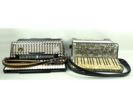 An early 20th century Matelli piano accordion, and a Hohner Atlantic 4 piano accordion, cased.