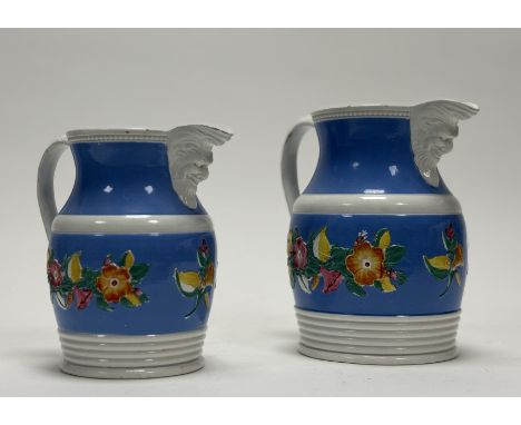 A pair of 19thc Stafforshire blue and white pitcher and jug, both decorated with moulded floral garland and sprig and moudled