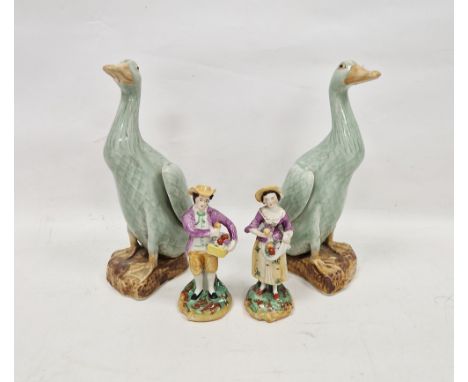 Pair of Chinese Export Kangxi-style celadon glazed models&nbsp;of ducks, on shaped mottled brown bases, impressed seal marks,