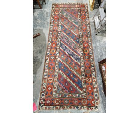 Caucasian-style runner&nbsp;with diagonal stripes of botehs to the central field and having geometric borders, 269cm x 106cm&