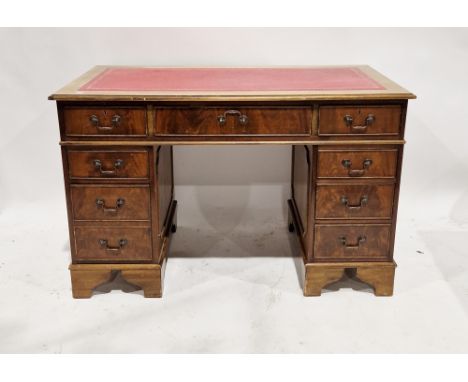 Late 19th/early 20th century mahogany twin pedestal desk&nbsp;with gilt tooled red leather inset top, having one long drawer 