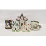 Three 19th century Staffordshire pottery models of gothic cottages in two sizes, applied with