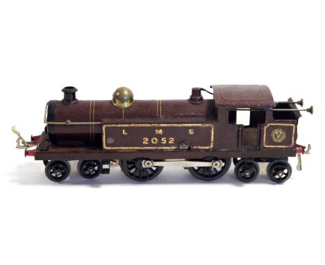 Hornby clockwork O'' gauge 4-4-4 tank engine number 2052 in LMS maroon livery