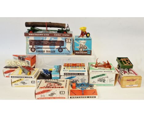Boxed Britains farming implements to include 9538 vari-spreader, 9560 timber trailer, 9537 acrobat rake, 9535 Muledozer, 9533