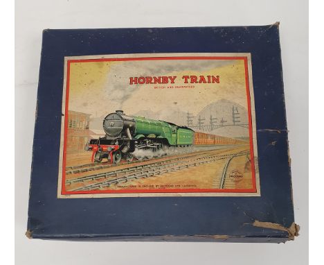 Hornby 0 gauge boxed train set containing a LMS 2270 0-4-0 clockwork locomotive, three LMS 12530 rolling stock, Motor Shell s