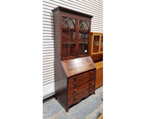 Victorian mahogany bureau bookcase, the top section having two glazed panels opening to reveal two adjustable shelves, raised