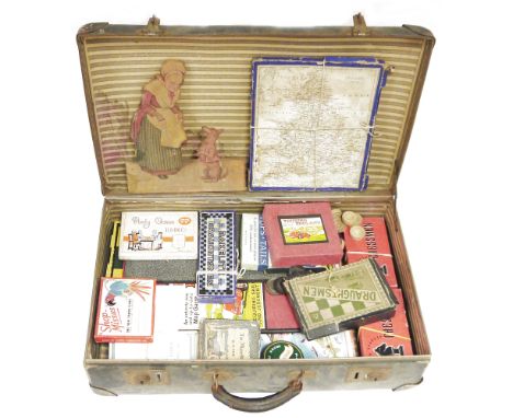 Various vintage games and puzzles to include 'Tops and Tails', a map game 'Touring England', 'Shop Mrs', 'Draughts', a Chad V