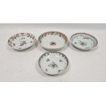 Two Chinese Export saucers comprising an example painted en grisaille with flower-sprays enriched in
