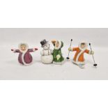 Three Goebel pottery figures emblematic of Winter, printed blue marks, painted and impressed