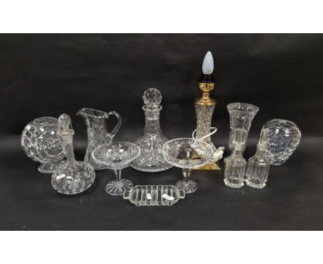 Assorted glassware, including: a gilt metal cut glass table lamp base, a pair of cruet bottles, a Stuart conical shaped decan