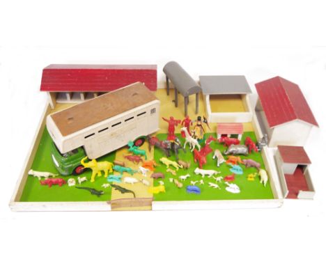 Quantity of plastic Britains farm animals, zoo animals, a Triang livestock lorry, vintage wooden horses on wheels, pulling li
