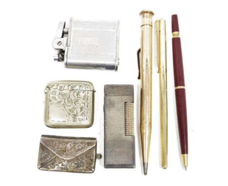 Edwardian silver stamp purse, a white metal acanthus engraved vesta case, a Ronson 'Whirlwind' engine-turned chromed lighter,