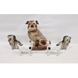 Pair of late 19th century Staffordshire pottery models of terriers with black and white patches,